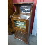 A Victorian walnut music cabinet