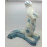 A David Sharp studio pottery figure of an otter, 28.