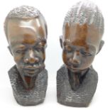 A pair of carved hardwood African busts, 26.