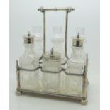 A six bottle cruet in a plated Walker & Hall stand