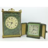 A Molnija clock, marked made in USSR, and a Bayard travel clock,