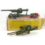 A Britains 155mm model gun, boxed and one other toy gun,