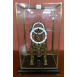 A brass architectural framed fusee skeleton clock,