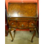 A Queen Anne style walnut bureau de dame