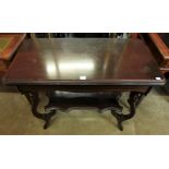 An Edward VII mahogany fold-over card table