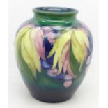 A Moorcroft pottery vase, restored,