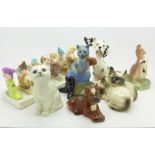 A Royal Doulton cat figure group, a Wade Collectors Club Dick Whittington figure,