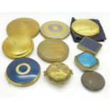 A collection of nine compacts and a musical brooch including two enamel compacts, a/f,
