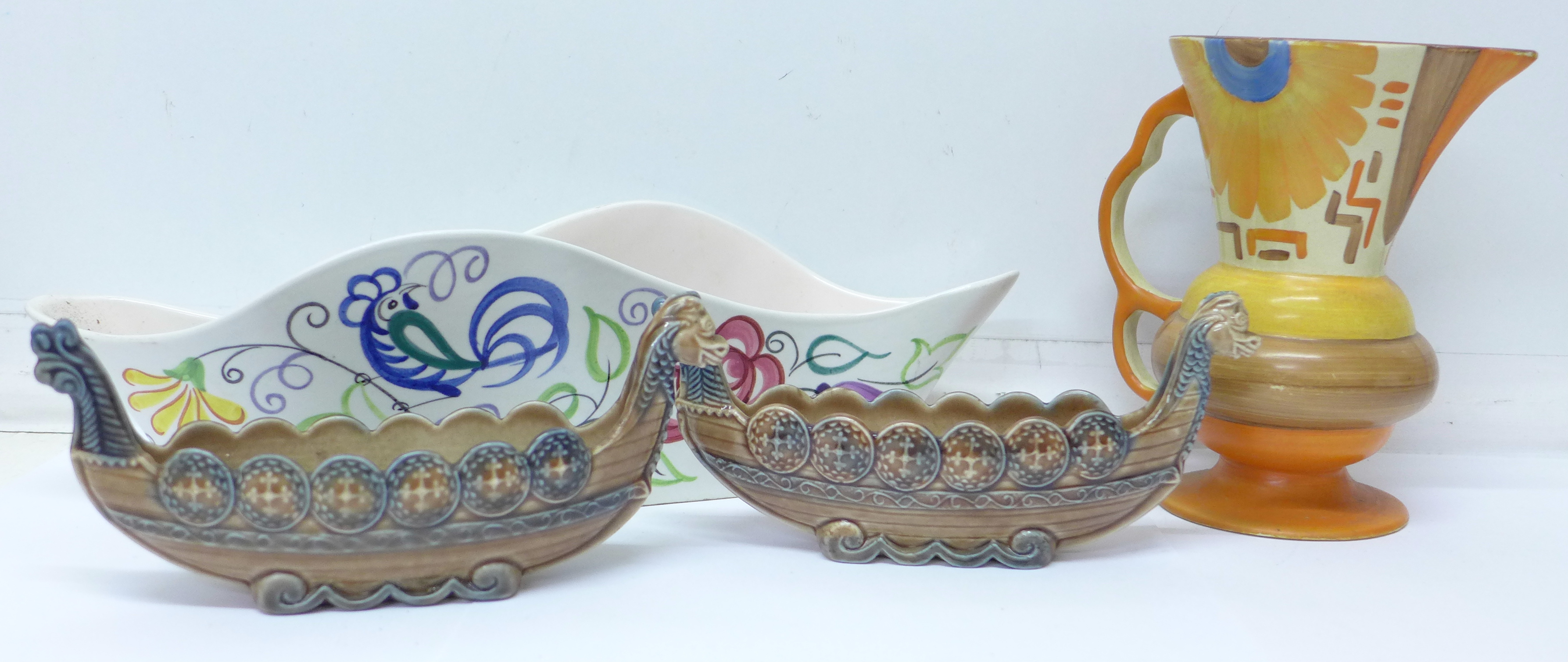 An Art Deco jug, a Poole planter and two Wade Viking boats,
