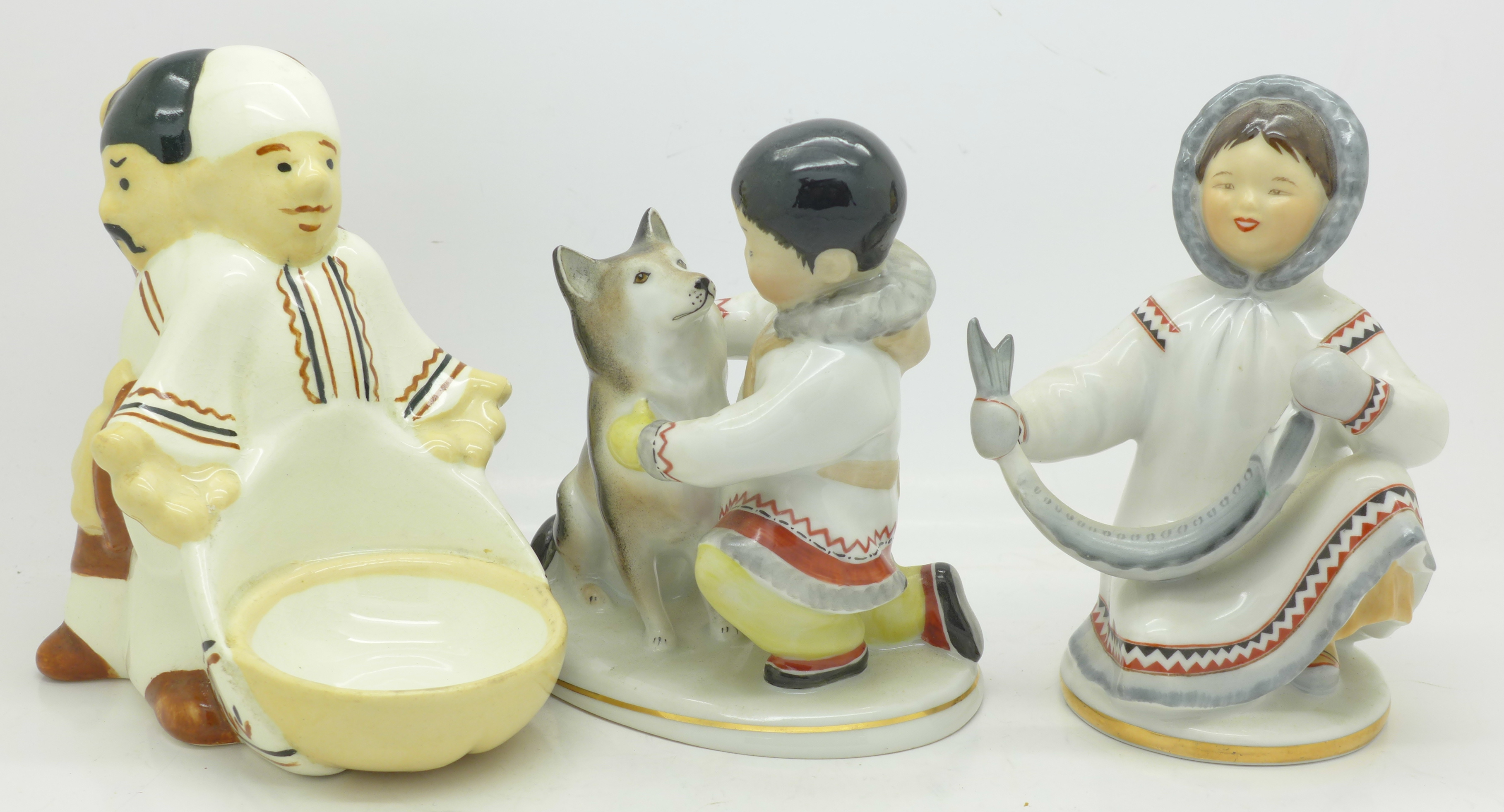 Two Russian Inuit figures, one a/f, and one other Russian figure group,