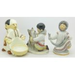 Two Russian Inuit figures, one a/f, and one other Russian figure group,