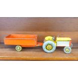 A Mettoy tin-plate tractor and trailer,