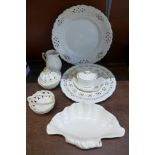 Nine items of Leeds Ware cream china; three pierced plates, basket, pot pourri,