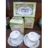 Three Royal Doulton Brambly Hedge cups and saucers and a dish,