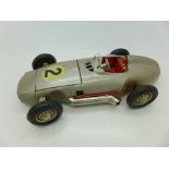 A 1950's tin-plate model racing car, marked Made in Western Germany, also marked Solo and D.B.Pat.