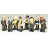 Eight Royal Doulton Dickens character figures,