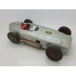 A 1950's tin-plate model racing car, marked Made in Western Germany, 33.