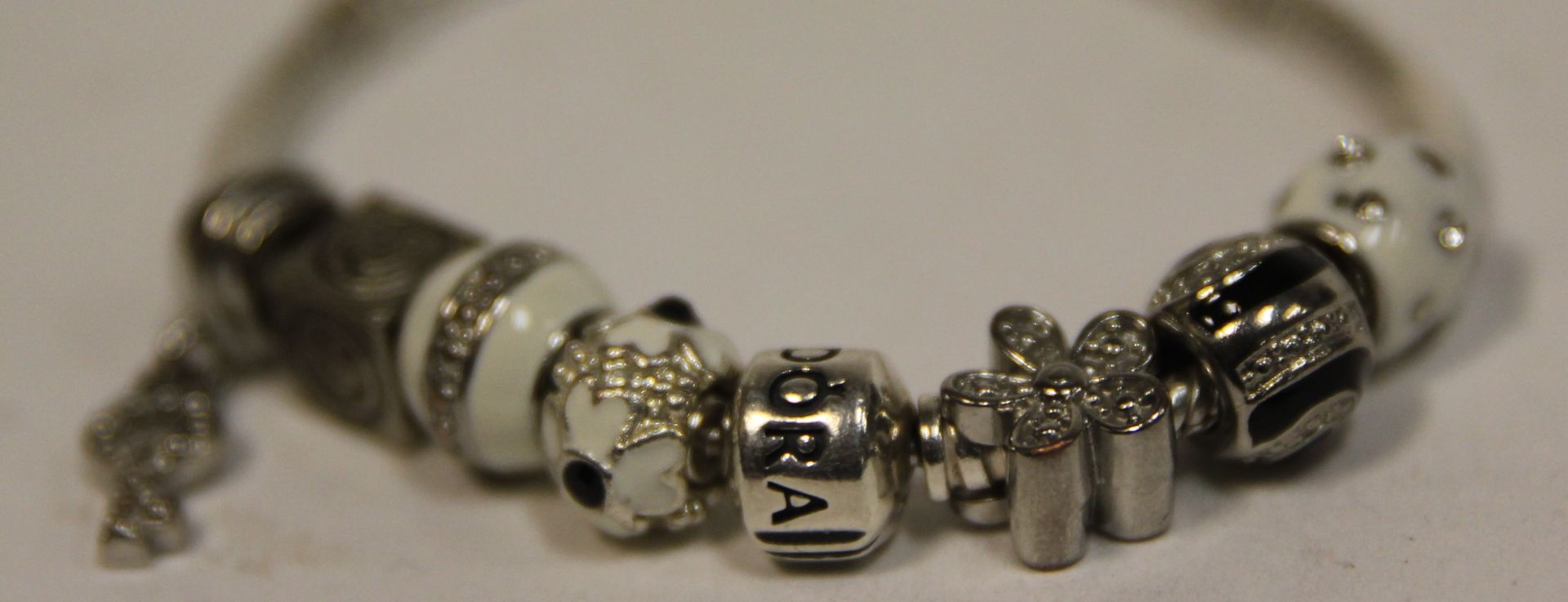 Three Pandora bracelets and seven Pandora charms. - Image 2 of 3