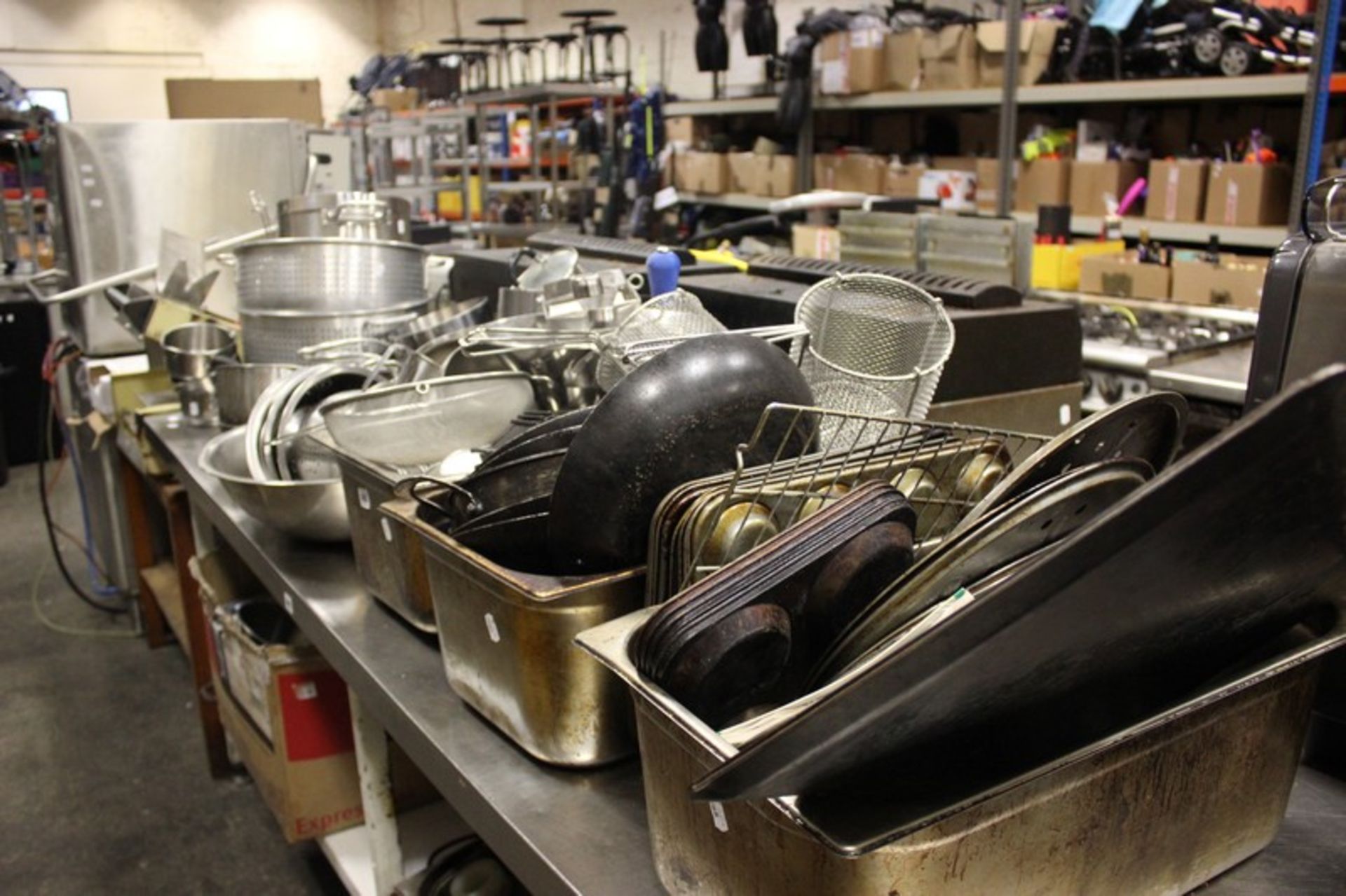 A quantity of catering to include pots, pans and accessories.