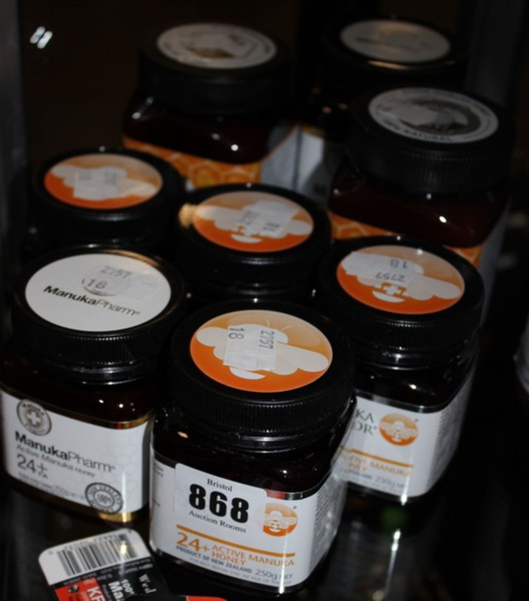 Eight jars of assorted Manuka honey to include Manuka Doctor, The Real Honey Company and Manuka