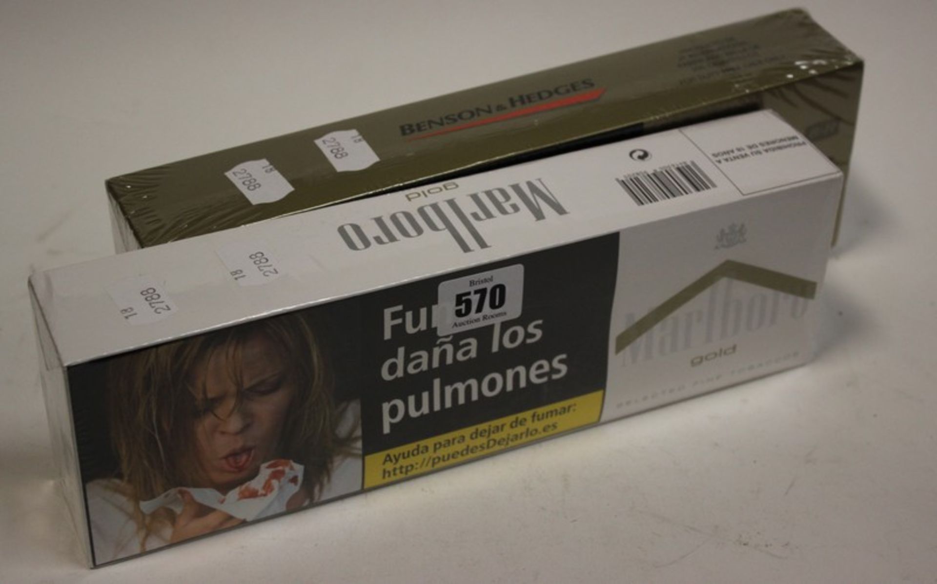 A carton of Benson & Hedges special filter cigarettes (200), a carton of Marlboro gold cigarettes (