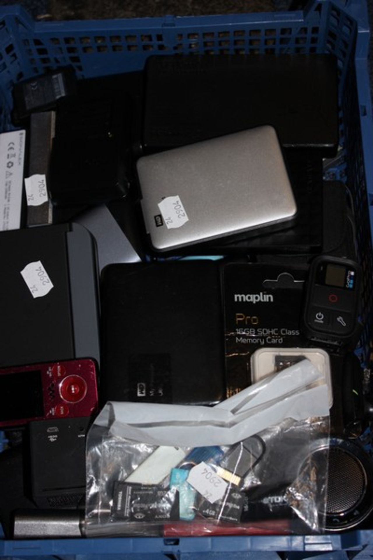 A quantity of powerbanks, memory sticks and external HDD etc.