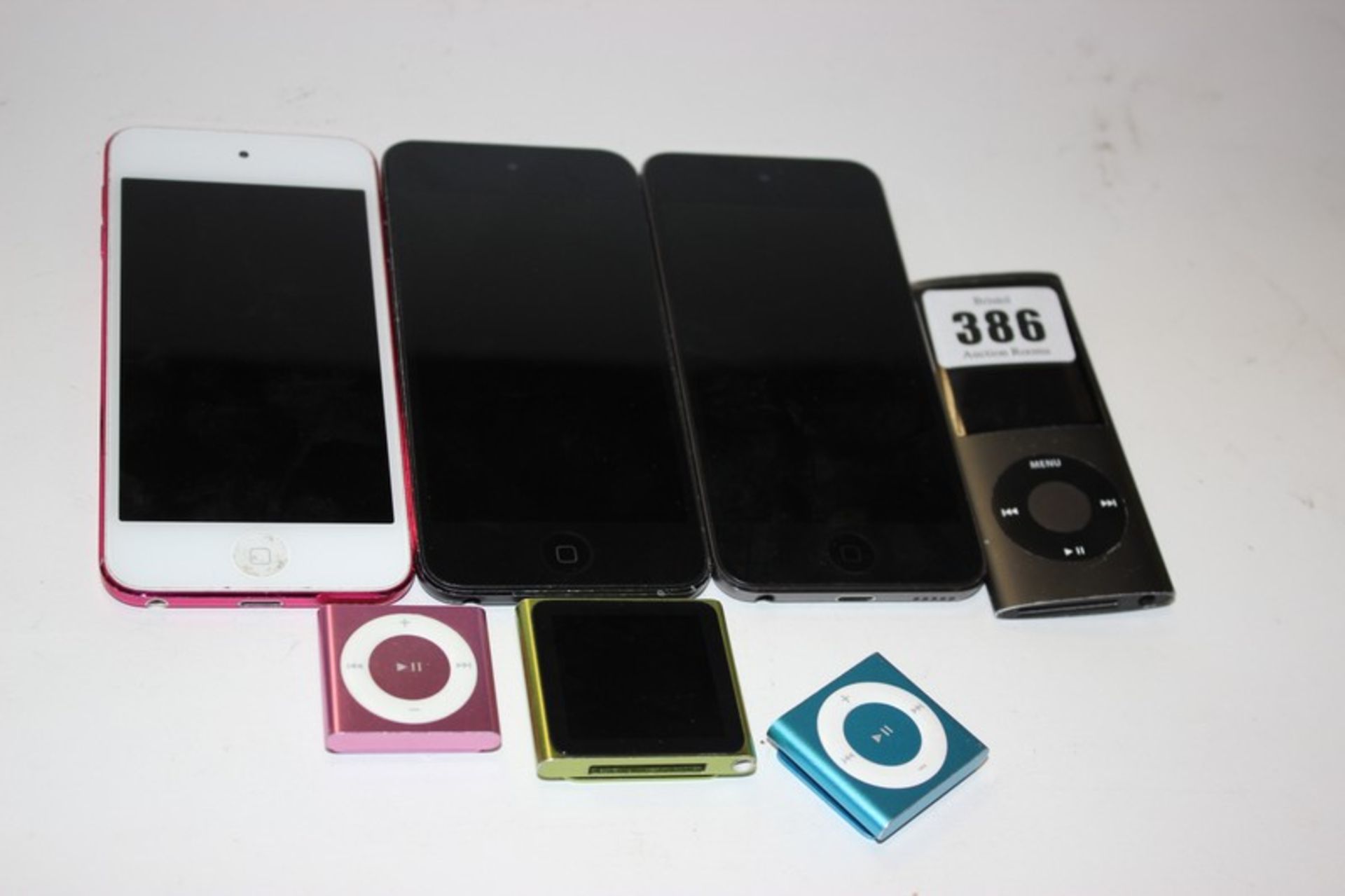 An iPod Touch 6th Generation A1574 serial: CCQQT2BMGGK2 (Activation locked), two iPod Touch 5th