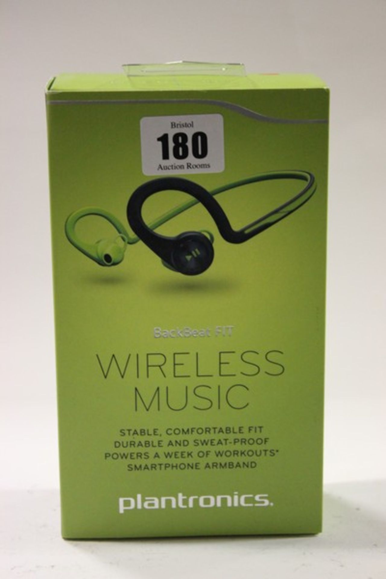 Two green Plantronics BackBeat FIT wireless stereo headphones with armband for a smartphone (Boxed