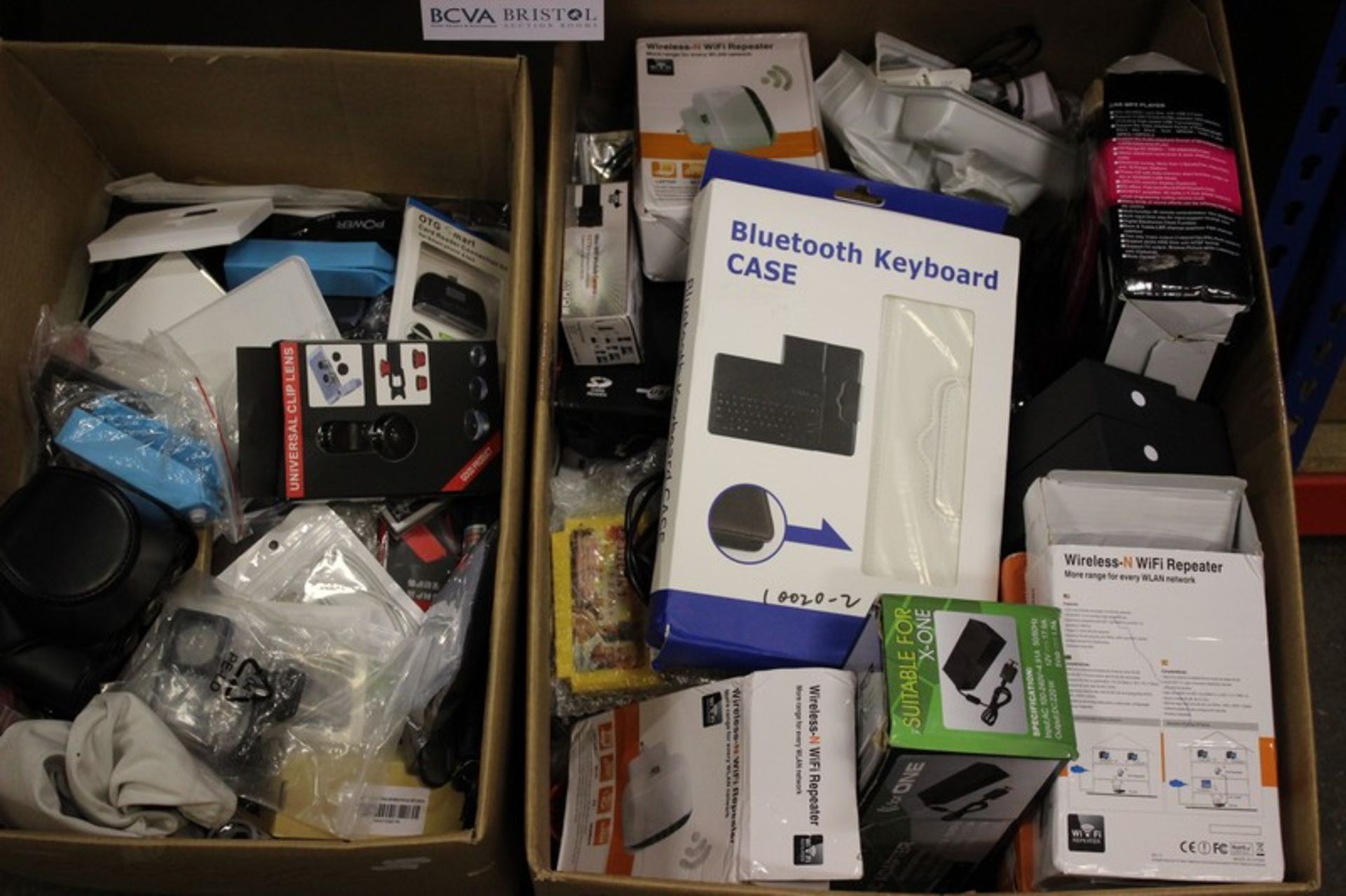 A box of phone cases and related items, a box of assorted leads, wireless Wi Fi repeaters, Airlink
