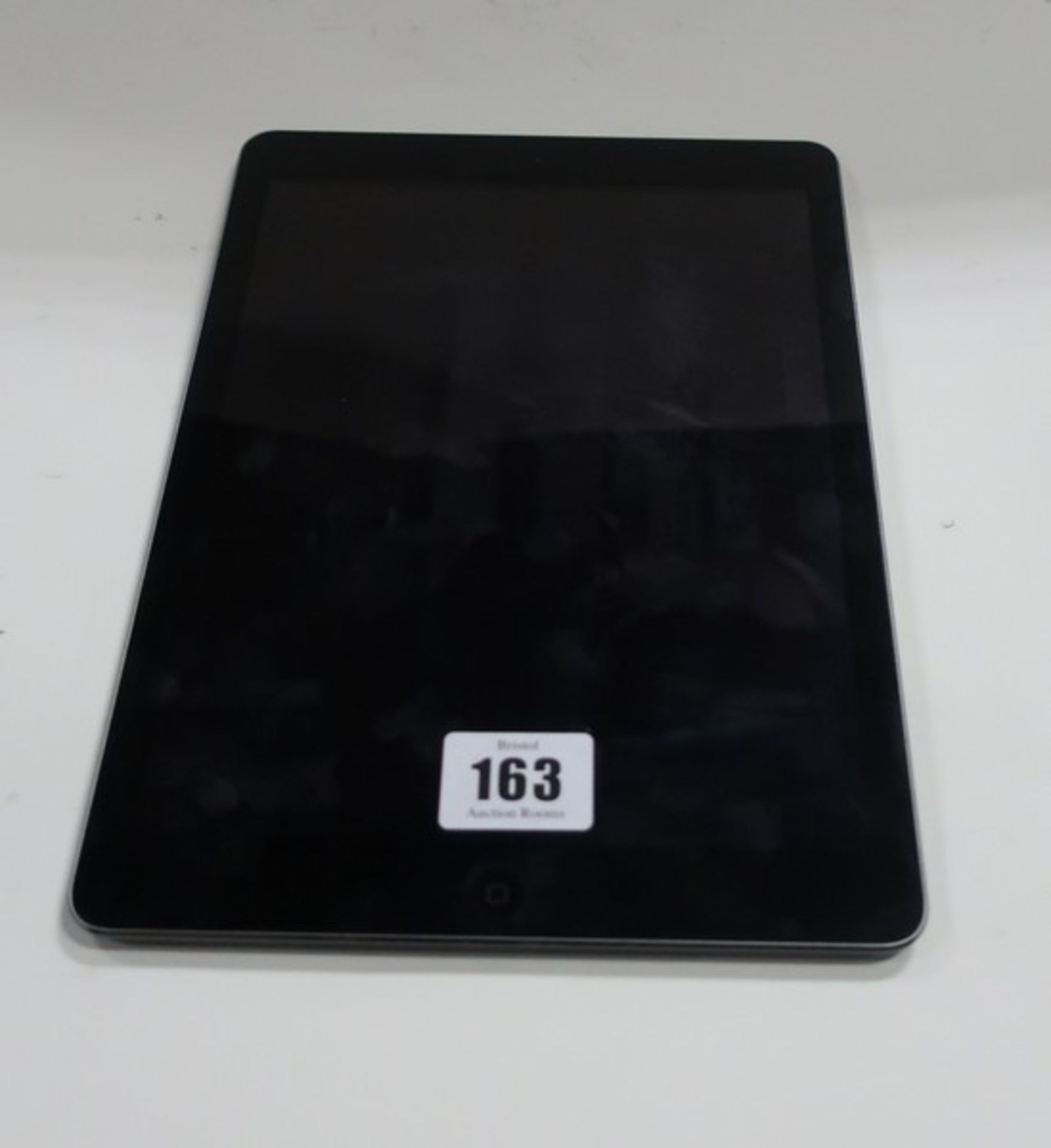 An iPad Air model A1474 32GB serial: DMPQ3ADJFK11 (Activation locked).