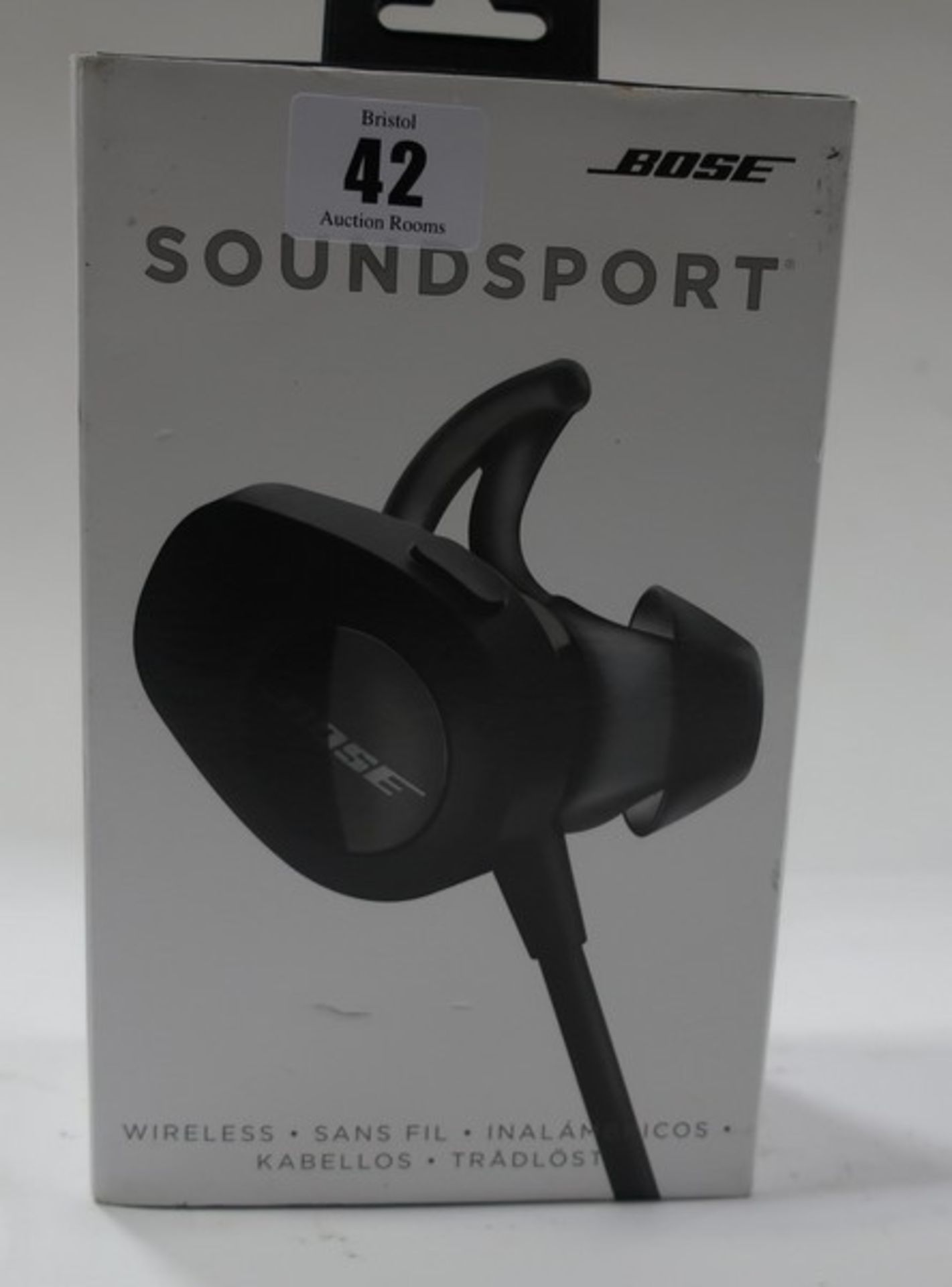 A pair of boxed as new Bose Soundsport headphones.