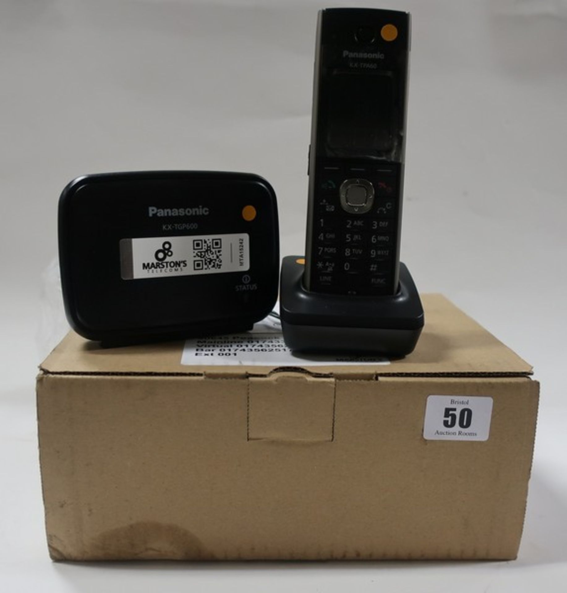 A boxed as new Panasonic KX-TGP600 VoIP/SIP Phone, 8 Lines, LCD Display and base station and a boxed