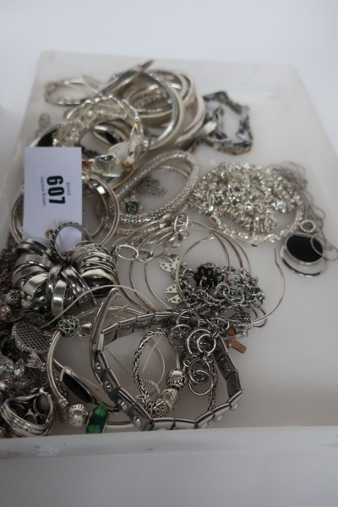 A collection of white metal costume jewellery.