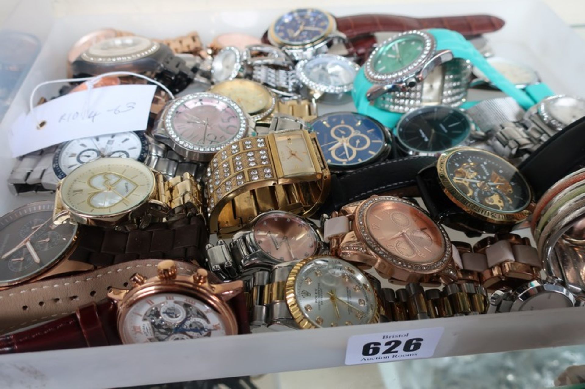 A large collection of high street fashion watches to include Michael Kors, DKNY, Armani etc.