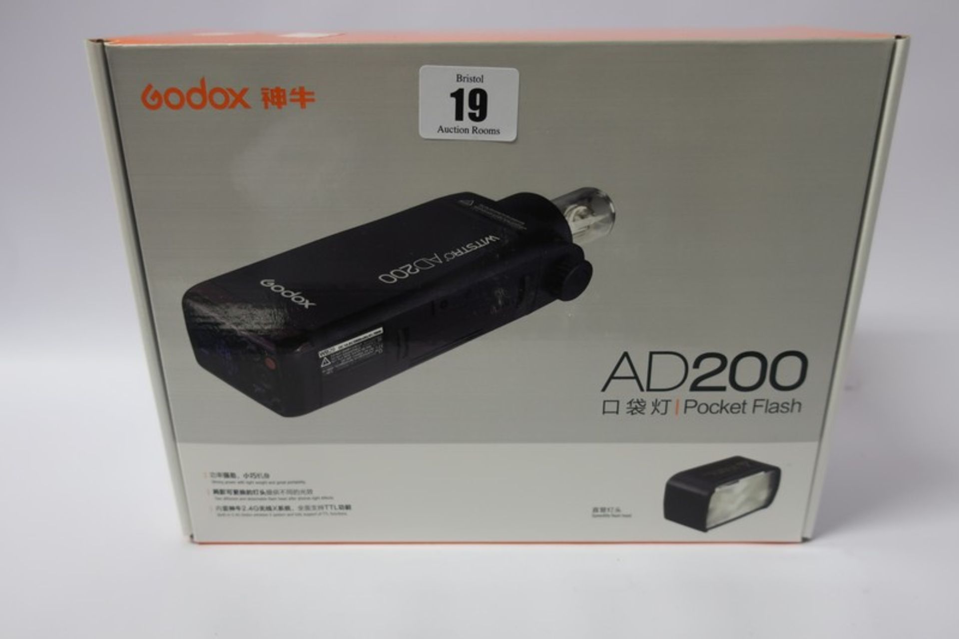 A boxed as new Godox AD200 pocket flash.