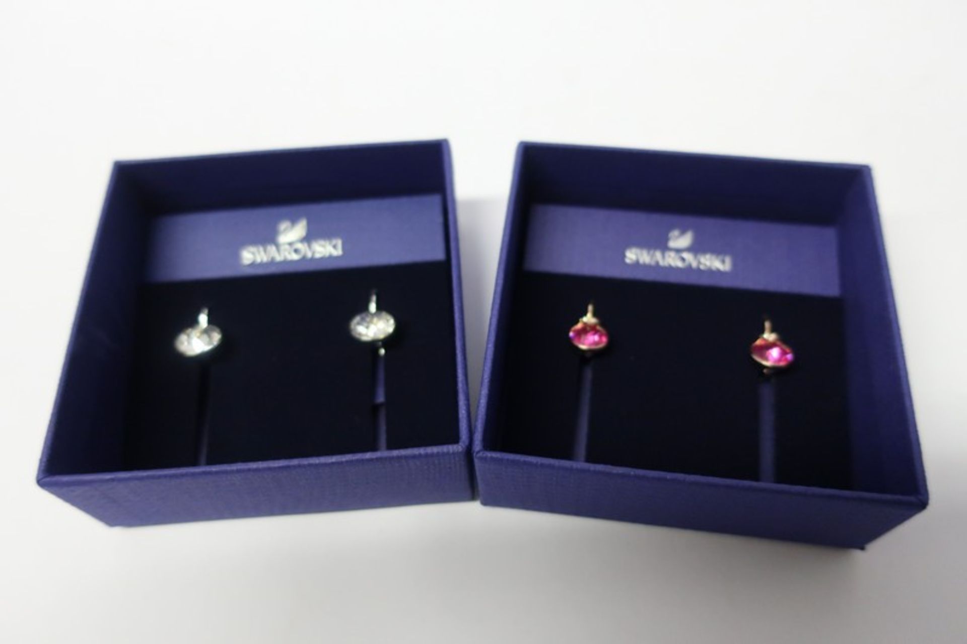 Two pairs of Swarovski (5085608) Bella pierced earrings mini crystal and a Swarovski (3589357) Bella