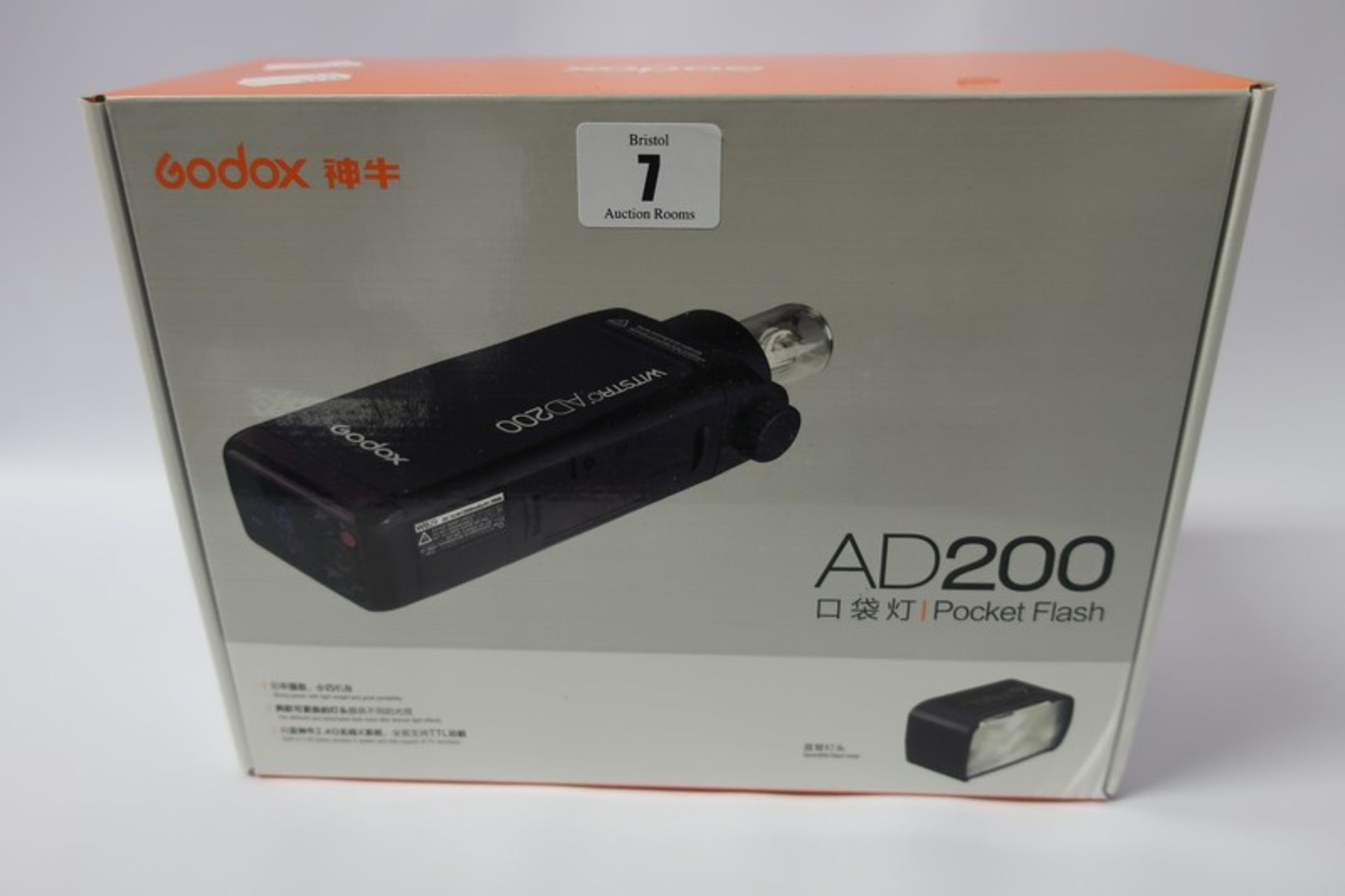 A boxed as new Godox AD200 pocket flash.