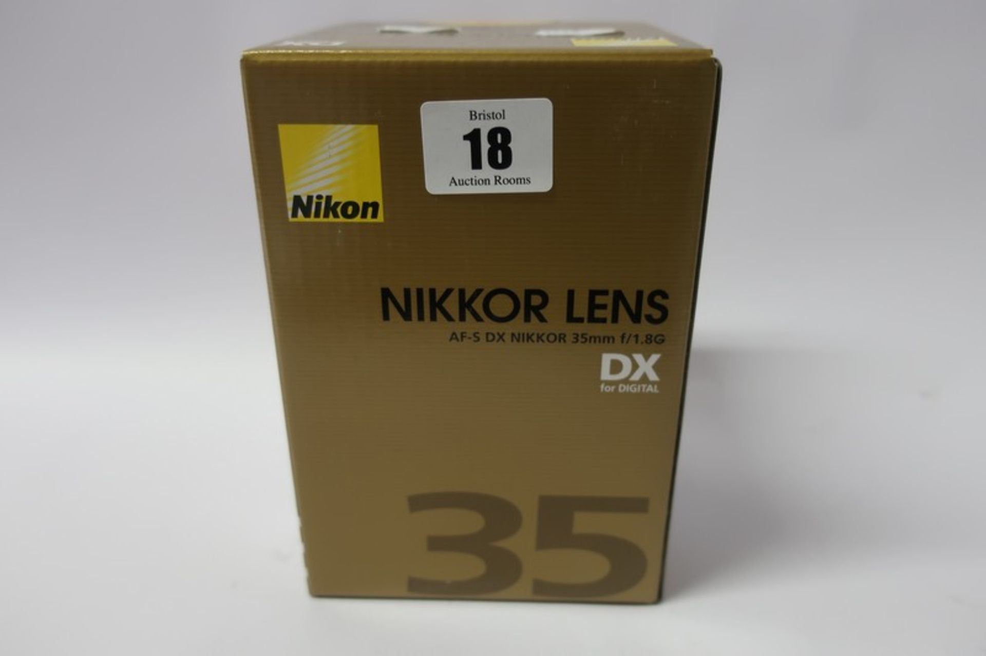 A boxed as new Nikon Nikkor AF-S DX 35mm f/1.8G lens.