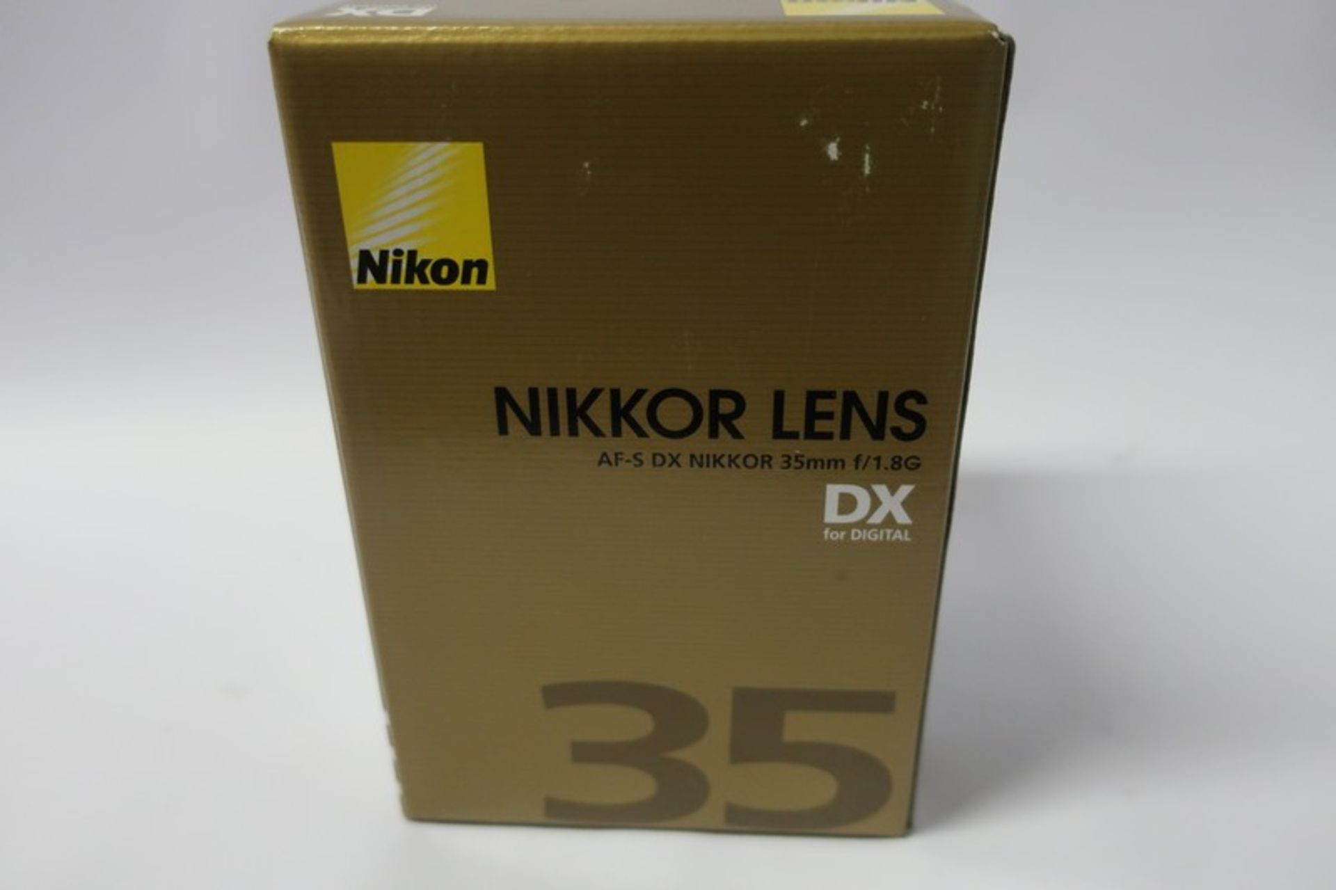 A boxed as new Nikon Nikkor AF-S DX 35mm f/1.8G lens.