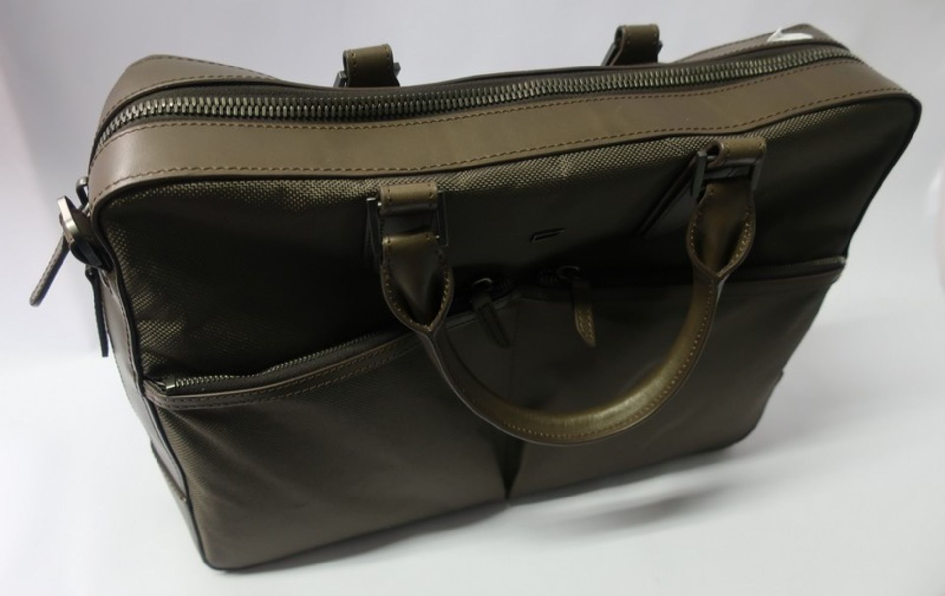 An as new Carl Friedrik Holdall in brown.