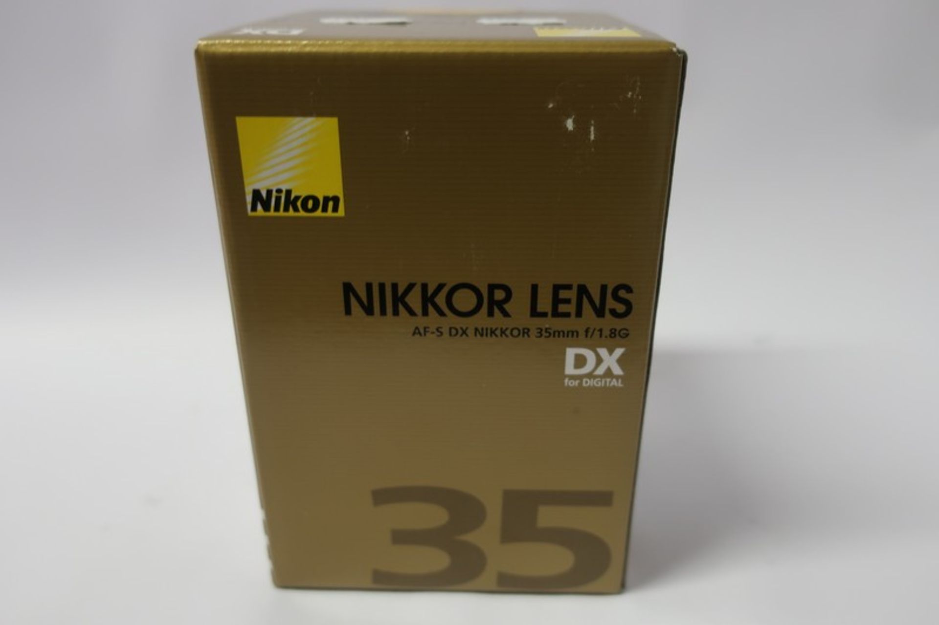 A boxed as new Nikon Nikkor AF-S DX 35mm f/1.8G lens.