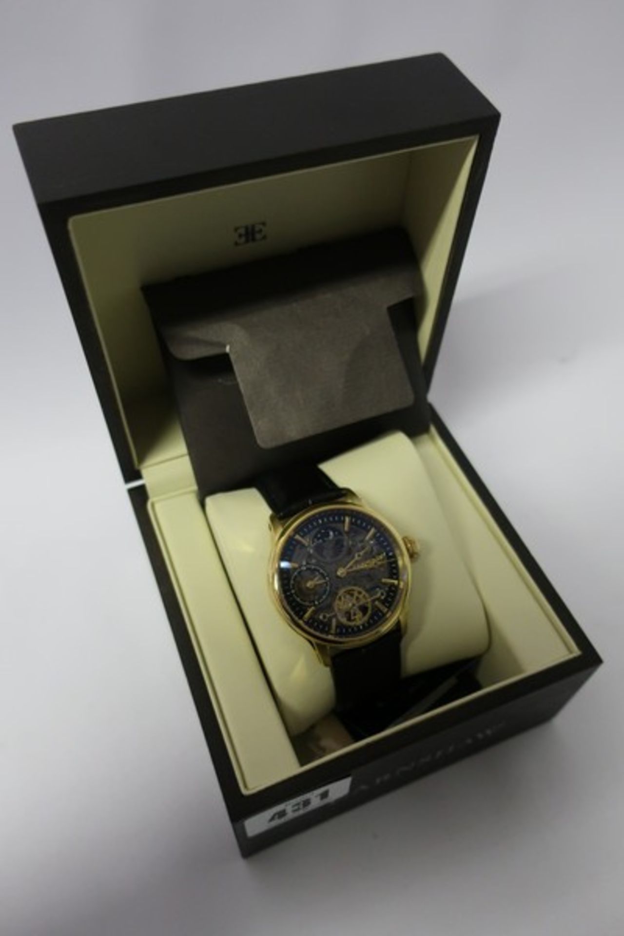 An as newThomas Earnhshaw Longitude Shadow automatic watch with black dial skeleton display and