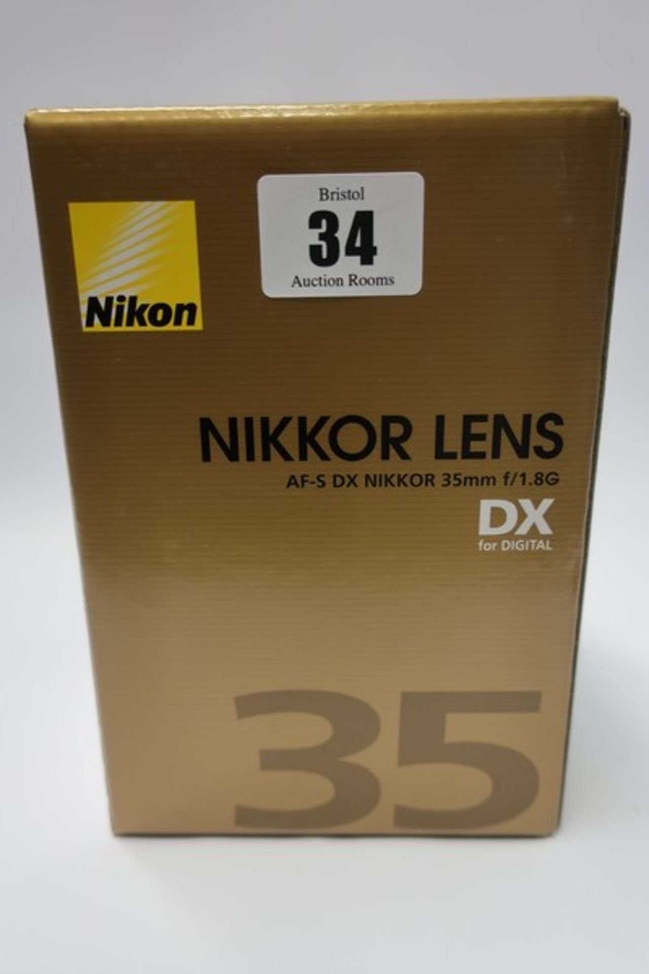 A boxed as new Nikon Nikkor AF-S DX 35mm f/1.8G lens.