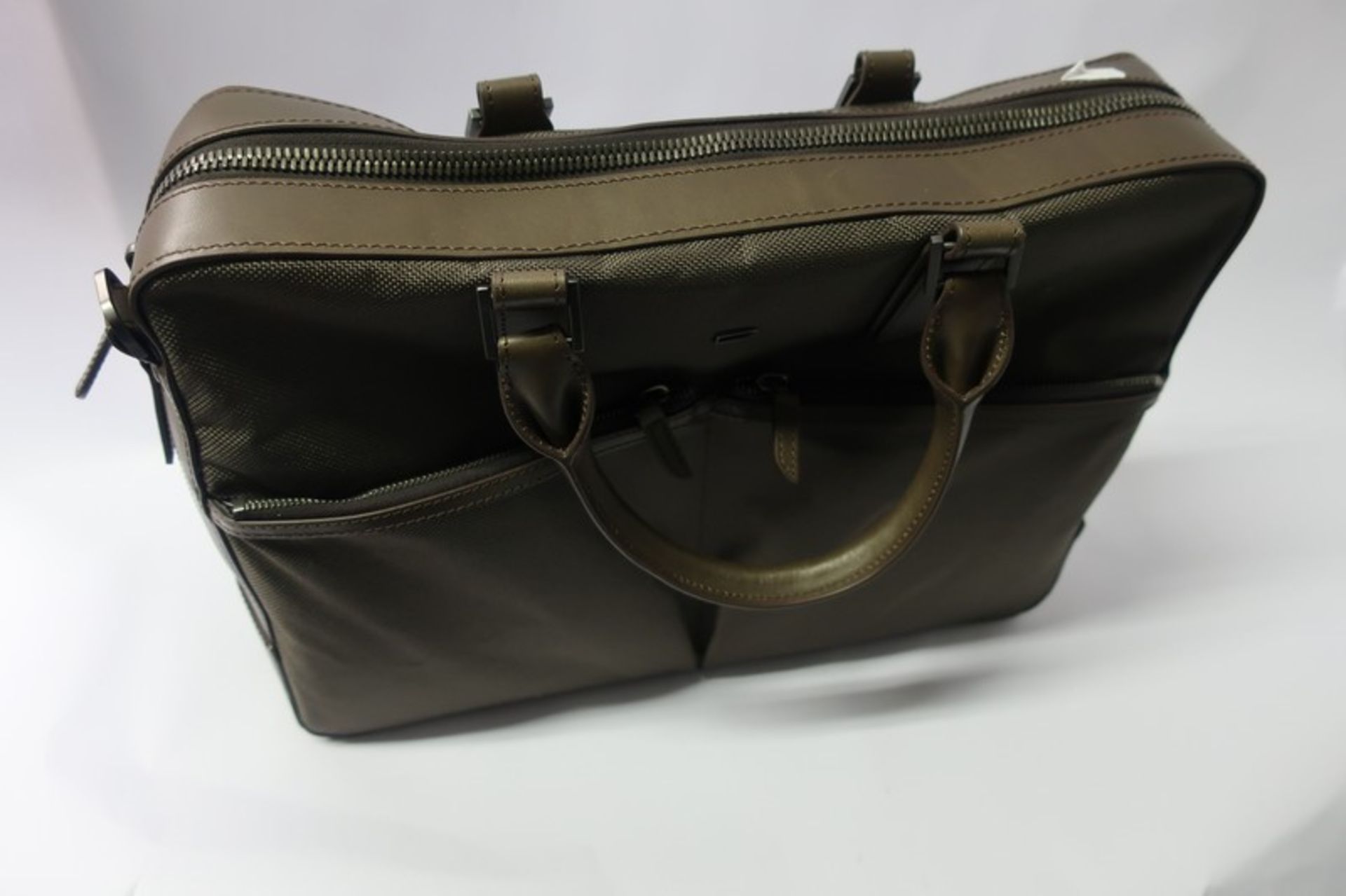 An as new Carl Friedrik Holdall in brown.