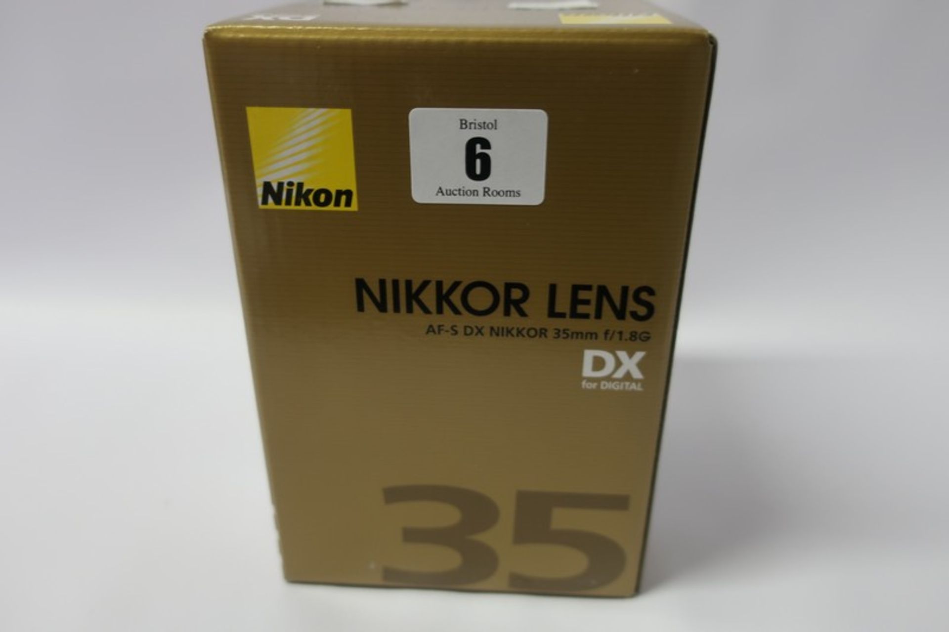 A boxed as new Nikon Nikkor AF-S DX 35mm f/1.8G lens.