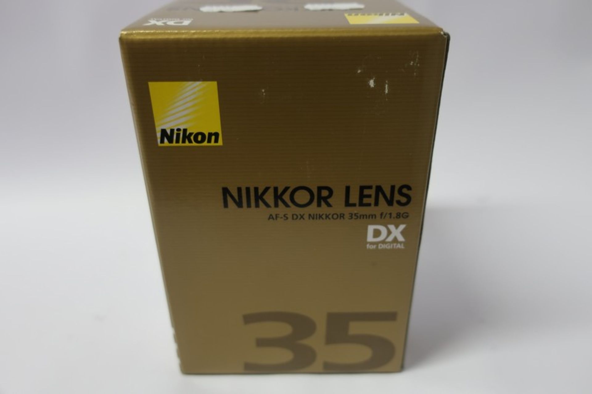 A boxed as new Nikon Nikkor AF-S DX 35mm f/1.8G lens.