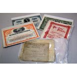 A selection of printed ephemera including share certificates and bonds etc