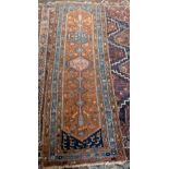 An Mosul Persian runner rug with a red/blue ground 80 x 230cm