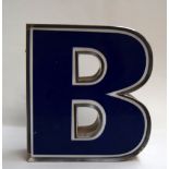 A perspex and metal 'B',