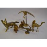 A selection of brass figurines of animals including foxes and a heron amongst others